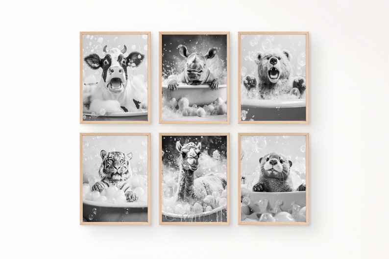 May include: Six framed black and white animal prints. Each print features a different animal, including a cow, rhino, bear, tiger, llama, and otter, all in bathtubs filled with bubbles. The prints have a light wood frame.