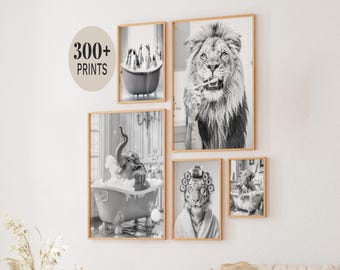 May include: A collection of framed black and white prints featuring animals in humorous poses. The prints include a lion brushing its teeth, an elephant in a bathtub, and a tiger with curlers. The text "300+ PRINTS" is also visible.