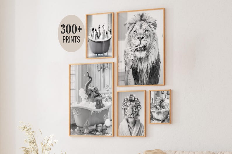 May include: A collection of framed black and white prints featuring animals in humorous poses. The prints include a lion brushing its teeth, an elephant in a bathtub, and a tiger with curlers. The text "300+ PRINTS" is also visible.