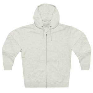 May include: A heather grey zip-up hoodie with a hood and a front pocket.