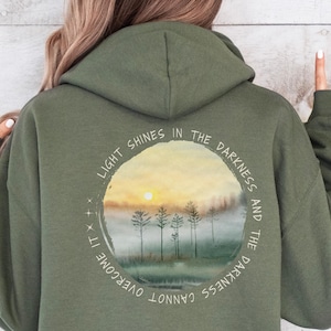 Light Shines in the Darkness Sun Shirt Christian Shirts Be the Light Bible Verse Shine Your Light Scripture Granola Girl Faith Based Jesus