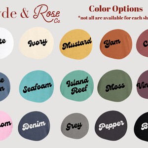 May include: Color options for t-shirts, shown as colored circles with text labels. Colors include White, Ivory, Mustard, Yam, Cumin, Blue Jean, Seafoam, Island Reef, Moss, Vineyard, Blossom, Denim, Grey, Pepper, and Black.