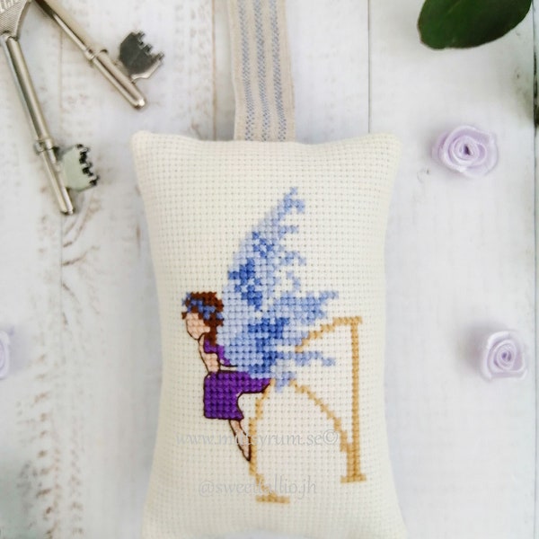 Keychain Keyring Cross stitch embroidered with motive of a Fairy sitting on the letter A