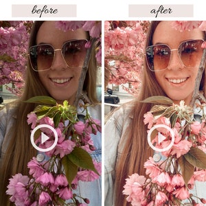 Op de afbeelding: Een vrouw met een zonnebril en een spijkerjack houdt een bos roze kersenbloesems vast. De bloemen staan ​​in volle bloei en hebben een zachte, delicate uitstraling.