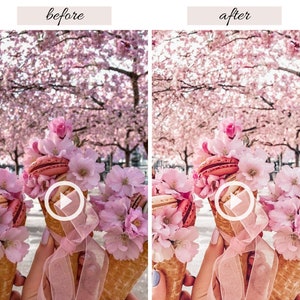 Op de afbeelding: Drie wafelt&uuml;ten gevuld met roze macarons en bedekt met roze kersenbloesems. De hoorntjes worden vastgehouden door handen tegen een achtergrond van een roze kersenboom.