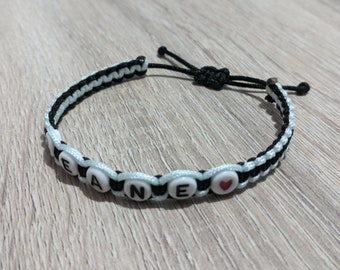 Bracelet with coloured Macramé cord and white beads with black writing, Perfect for your child or future big brother or sister