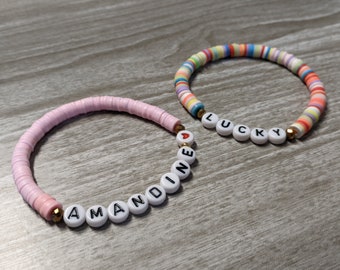 Summer bracelet with coloured Heishi beads and white beads in black script, Perfect for the end of the school year or the holidays