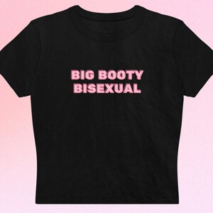 May include: Black cropped t-shirt with the text "BIG BOOTY BISEXUAL" in pink.