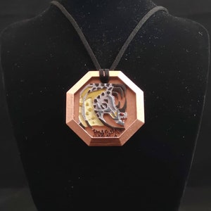 Shagura Magala Coin Pendant