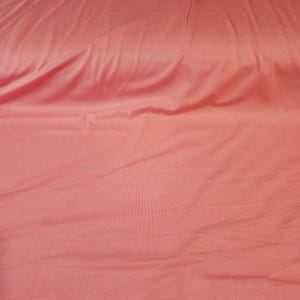 Coral Pink Knit Fabric, Summer Flowy Fabric, Rayon Modal Blend with 4-Way Stretch, Ultra Soft Feel, Medium weight, Sold by the 1/2 yard