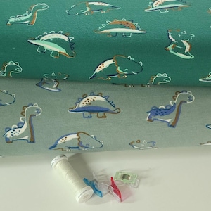 Dinosaur Jersey Knit Fabric, Fun and Colorful Organic Cotton Spandex, European Sourced, Quality Fabric, 4-way Stretch. Sold by the 1/2 yard