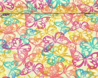 May include: A fabric with a repeating pattern of colorful butterflies in shades of pink, blue, yellow, and orange. The butterflies are layered on a cream-colored background, creating a vibrant and cheerful design.