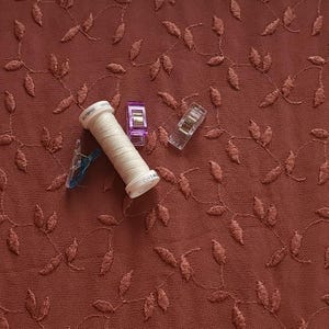Rayon Embroidered Fabric, Vine Leaf Design on Semi Sheer Woven Fabric. Light and Flowy Fabric. 100% Rayon Woven Fabric. Sold by the 1/2 yard