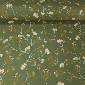 May include: Close-up of a fabric with a repeating floral pattern. The fabric has a muted green background with a design of yellow and white flowers and stems. The flowers have a stylized, outlined appearance.