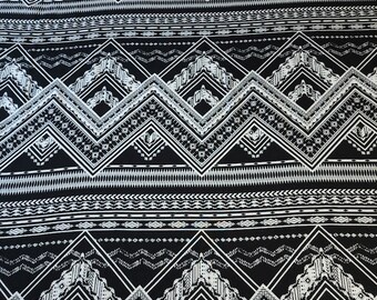 Rayon Challis Fabric. Black and White Boho Print. A Very Nice Light and Flowing Fabric. Nice Rayon Woven Fabric. Sold by the 1/2 yard