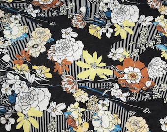 Floral Knit Blend, Viscose Spandex. Stunning Flowers on Black, Flowy Drape, European Sourced, 4-Way Stretch, Sold by the 1/2 yard.