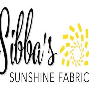 May include: The Sibba's Sunshine Fabrics logo features elegant black cursive script above the words "SUNSHINE FABRICS" in a simple sans-serif font. A yellow sunburst design is to the right of the text on a white background.