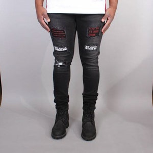 Jeans aderenti strappati neri