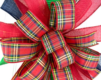 Holiday Bow in red, green, navy, white and some gold.