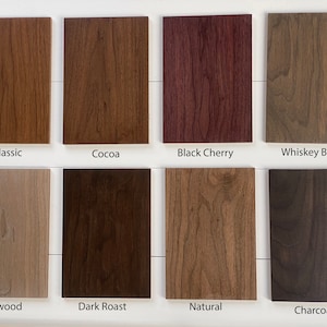 May include: A wood stain color chart with 10 different wood stain colors. The colors are: Walnut, Classic, Cocoa, Black Cherry, Whiskey Barrel, Driftwood, Dark Roast, Natural, and Charcoal.
