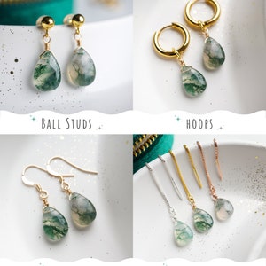 May include: Four different styles of earrings featuring green agate stone drops. The styles include ball studs, hoops, hooks, and threaders.