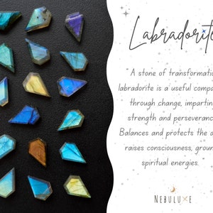 May include: Arrangement of polished labradorite gemstones in various shapes and colors, including blue, green, and gold, on a black surface. The word "Labradorite" is written in cursive, with text describing the stone's properties.