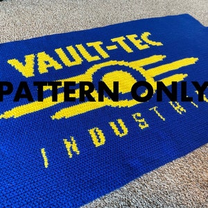 May include: A blue and yellow crochet blanket featuring the Vault-Tec Industries logo. The text "PATTERN ONLY" is written in black on the blanket.