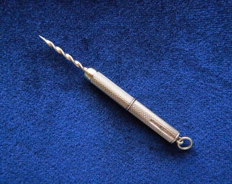 Vintage cigarrpiercer i 9k massivt guld. 1965.