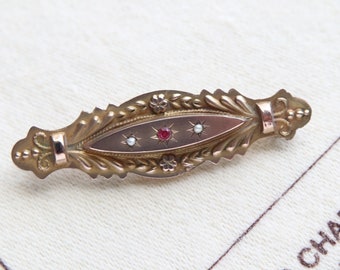 Victorian 9k gold bar brooch in Etruscan Revival Style.
