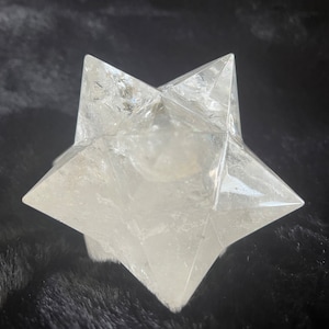 This is an XL genuine Clear Quartz Stellated Dodecahedron that has been cleansed and infused with Reiki. This gorgeous Clear Quartz Star is big and weighs 1.75 lbs! This is Sacred Geometry and Metatron's Cube.