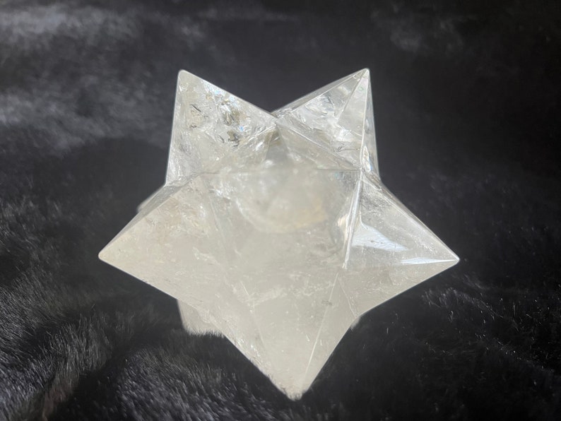 This is an XL genuine Clear Quartz Stellated Dodecahedron that has been cleansed and infused with Reiki. This gorgeous Clear Quartz Star is big and weighs 1.75 lbs! This is Sacred Geometry and Metatron's Cube.