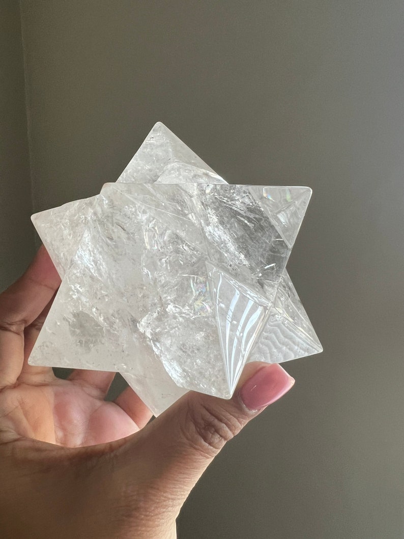 This is an XL genuine Clear Quartz Stellated Dodecahedron that has been cleansed and infused with Reiki. This gorgeous Clear Quartz Star is big and weighs 1.75 lbs! This is Sacred Geometry and Metatron's Cube.