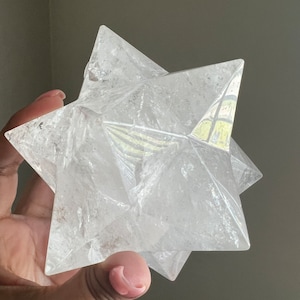 This is an XL genuine Clear Quartz Stellated Dodecahedron that has been cleansed and infused with Reiki. This gorgeous Clear Quartz Star is big and weighs 1.75 lbs! This is Sacred Geometry and Metatron's Cube.