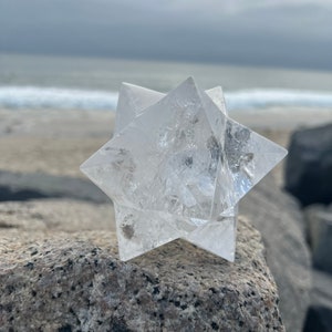 This is an XL genuine Clear Quartz Stellated Dodecahedron that has been cleansed and infused with Reiki. This gorgeous Clear Quartz Star is big and weighs 1.75 lbs! This is Sacred Geometry and Metatron's Cube.