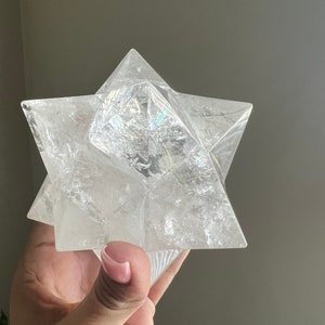 This is an XL genuine Clear Quartz Stellated Dodecahedron that has been cleansed and infused with Reiki. This gorgeous Clear Quartz Star is big and weighs 1.75 lbs! This is Sacred Geometry and Metatron's Cube.