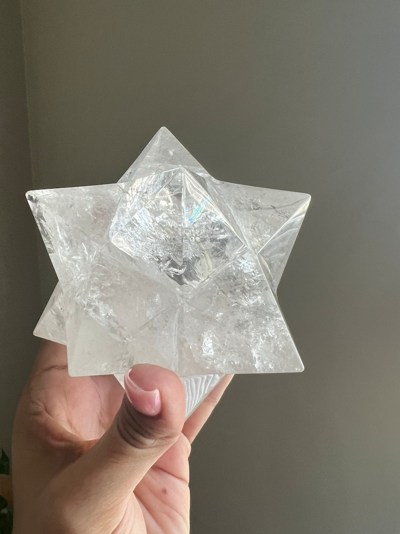 This is an XL genuine Clear Quartz Stellated Dodecahedron that has been cleansed and infused with Reiki. This gorgeous Clear Quartz Star is big and weighs 1.75 lbs! This is Sacred Geometry and Metatron's Cube.