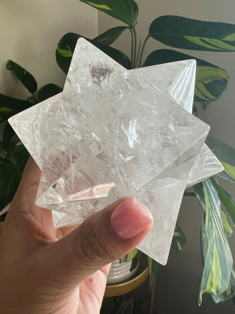 This is an XL genuine Clear Quartz Stellated Dodecahedron that has been cleansed and infused with Reiki. This gorgeous Clear Quartz Star is big and weighs 1.75 lbs! This is Sacred Geometry and Metatron's Cube.