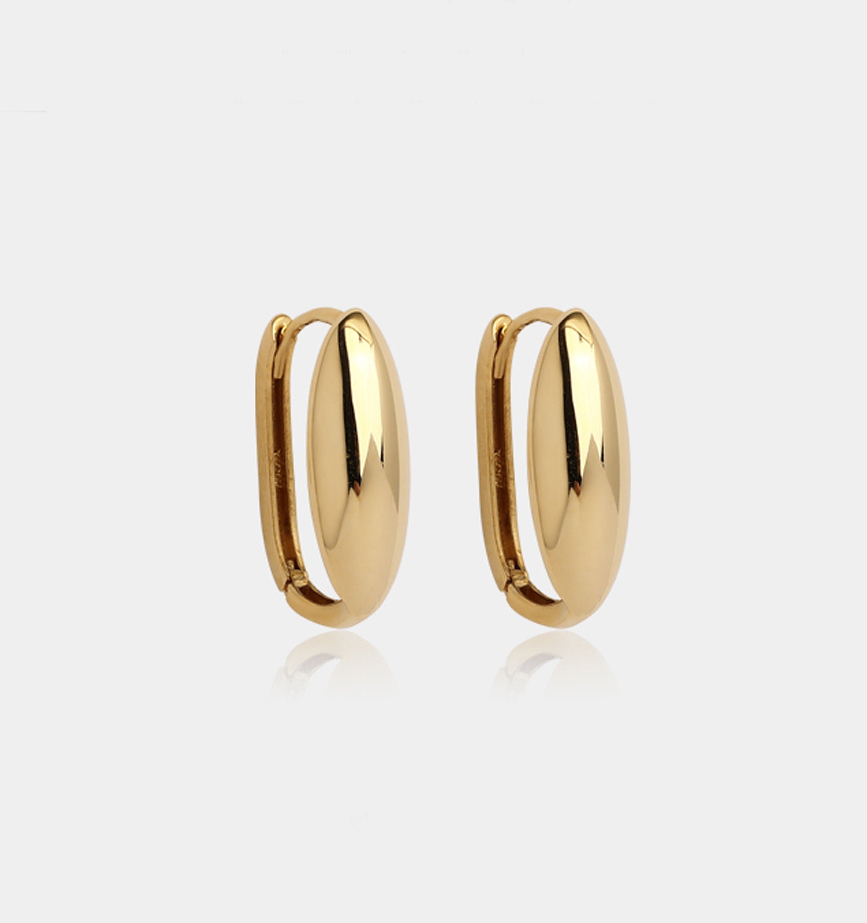 Solid gold huggie sale earrings