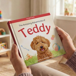May include: A hardcover children's book titled "The Amazing Adventures of Teddy" featuring a smiling brown dog illustration. The book cover has a red border and the Modpaws logo.