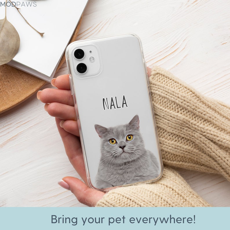 May include: A clear phone case with a gray cat image and the name "Nala" printed on it.