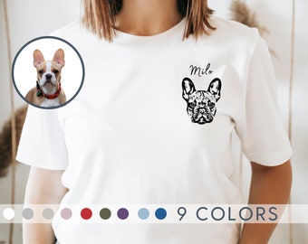 May include: White t-shirt with a black and white illustration of a French Bulldog and the name "Milo" printed on the front. The shirt is available in 9 colors.