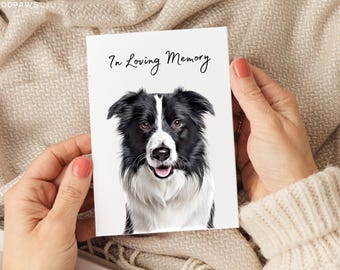May include: A white greeting card featuring a realistic illustration of a black and white Border Collie dog with the text In Loving Memory printed in black script at the top. The dog has a white blaze on its face and a pink tongue visible.