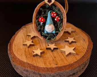 Walnut shell bearded gnome in a mushroom grove, rustic tree decoration. Unique addition to your tree.