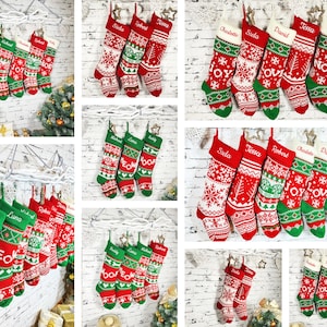 May include: A collection of red, green, and white Christmas stockings with personalized names embroidered in white. The stockings feature various patterns, including snowflakes and geometric designs, and are hung against a white brick wall.