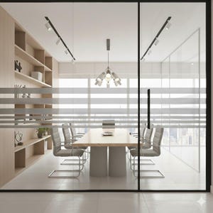 May include: A modern conference room with a large wooden table and six gray chairs. The room features a glass wall, wooden shelves, and track lighting. The room is well-lit and appears to be in a high-rise building.