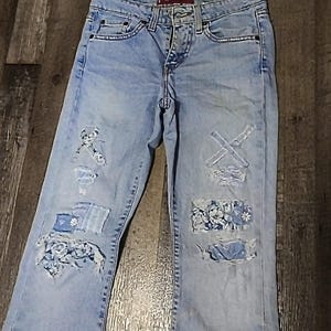 Vintage Patched Levi Jeans | Upcycled Distressed Holey Patched Faded Jeans | Levi's 519 Flare Leg Low Rise Bell Bottoms | Junior's Size 1.