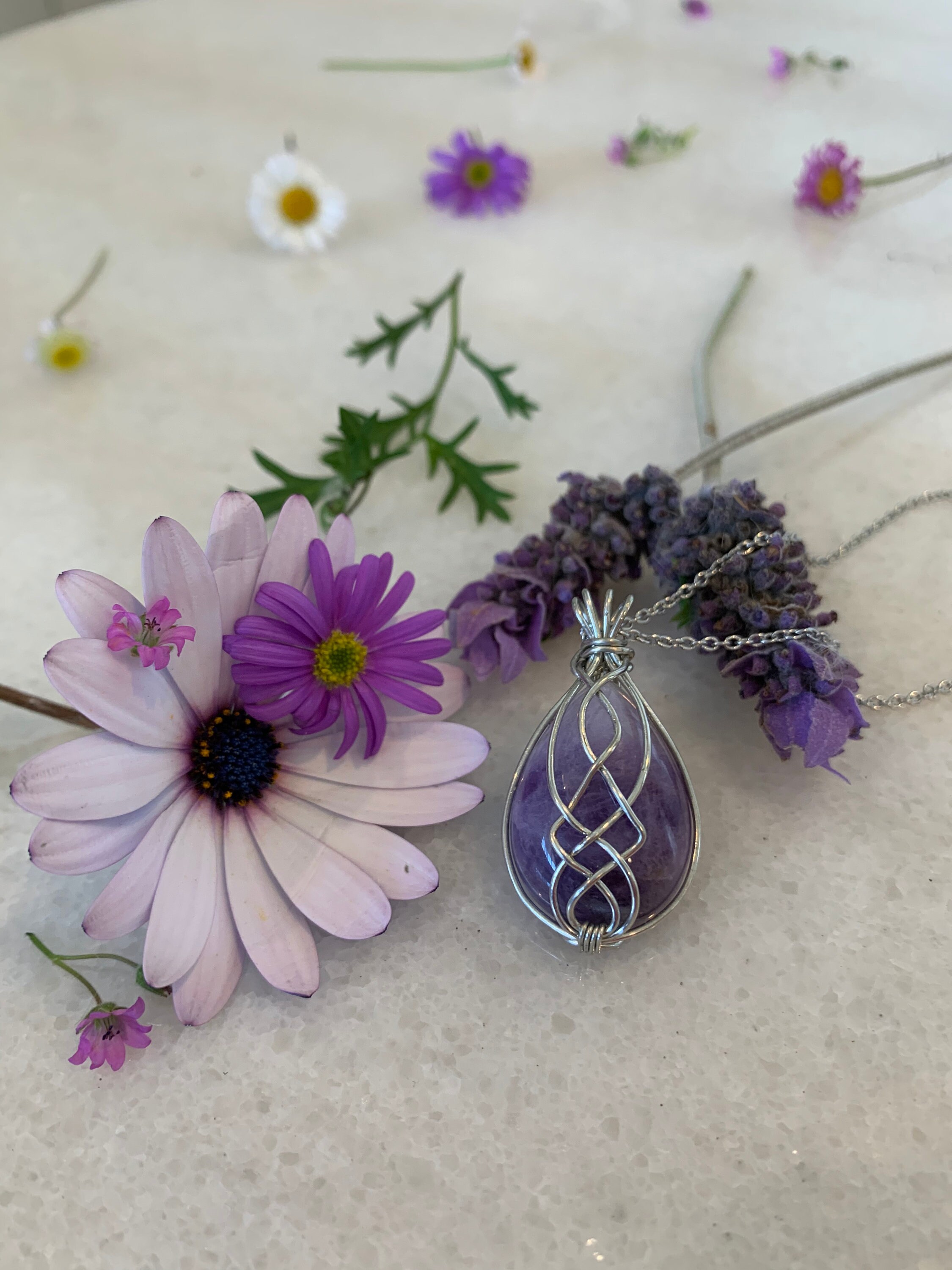 Wire clearance wrapped amethyst