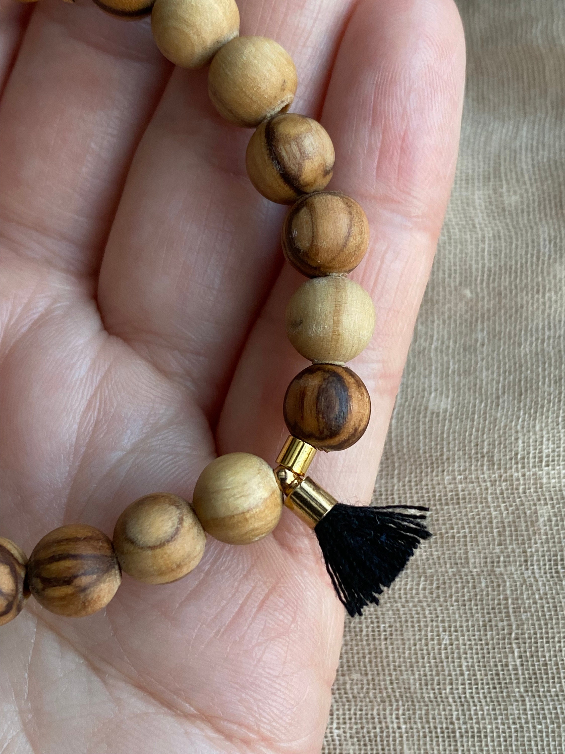 Olive Wood ~ Gold Plated Beads and Black Tassel ~ Beaded Wooden Stretch Bracelet ~ Wooden Jewelry ~ Tassel Bracelet ~ Stacker Bracelet