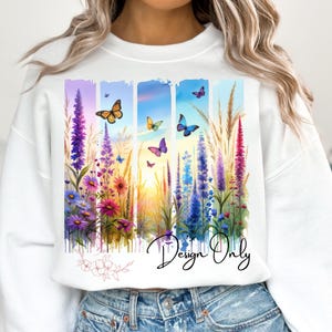 Puede incluir: Sudadera blanca con un dise&ntilde;o de acuarela de flores coloridas y mariposas. El dise&ntilde;o incluye una puesta de sol y el texto "Design Only".