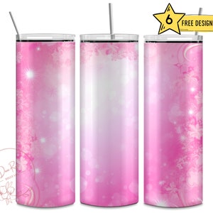May include: Three pink and white stainless steel tumblers with a floral design and glitter accents. The tumblers are 20 ounces each and have a straw.